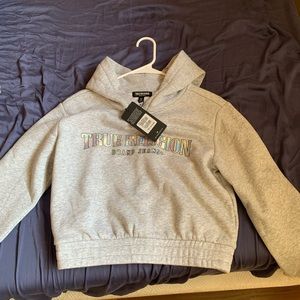 Selling brand new true religion sweater for women.